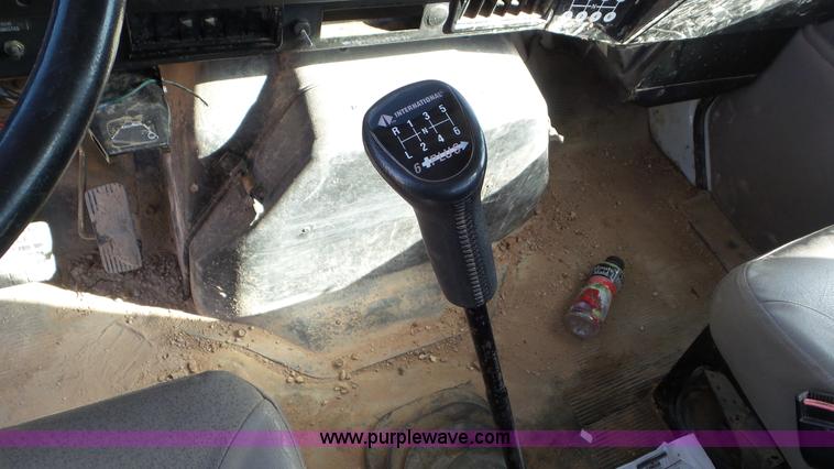 image for item J1335 1998 International 4700 flatbed truck