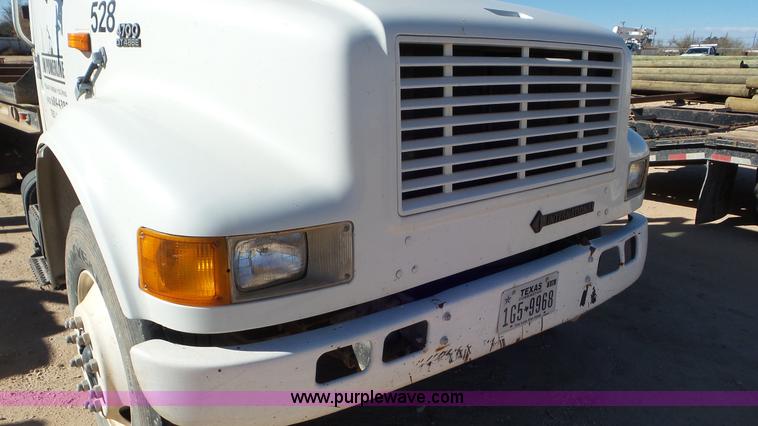 image for item J1335 1998 International 4700 flatbed truck