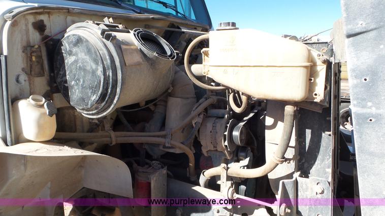 image for item J1335 1998 International 4700 flatbed truck