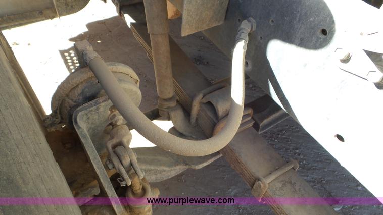 image for item J1335 1998 International 4700 flatbed truck