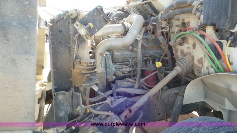 image for item J1335 1998 International 4700 flatbed truck