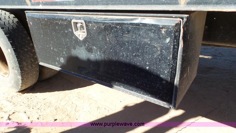 image for item J1335 1998 International 4700 flatbed truck