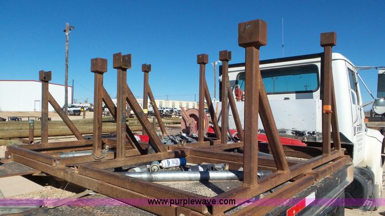 image for item J1335 1998 International 4700 flatbed truck