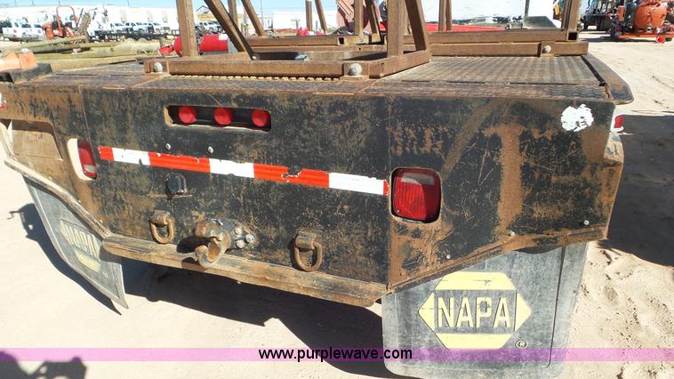 image for item J1335 1998 International 4700 flatbed truck