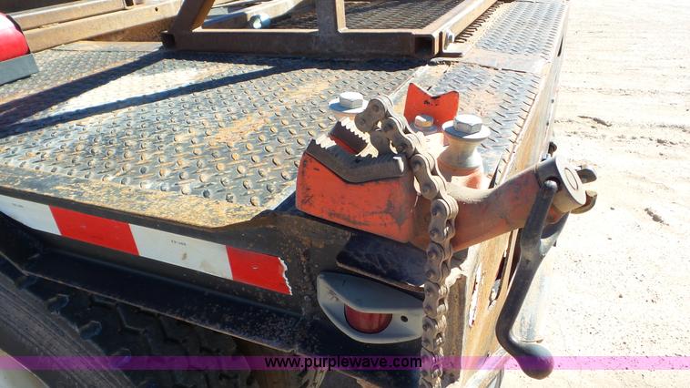 image for item J1335 1998 International 4700 flatbed truck