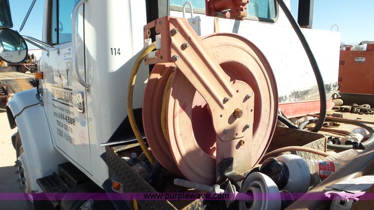 image for item J1335 1998 International 4700 flatbed truck