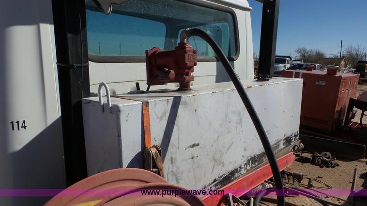 image for item J1335 1998 International 4700 flatbed truck