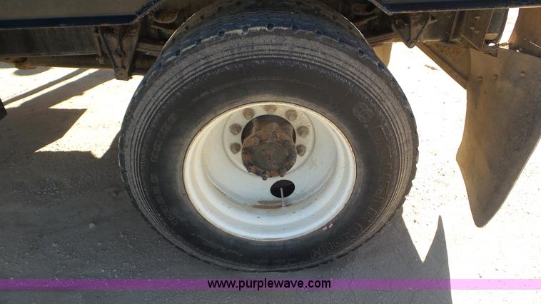 image for item J1335 1998 International 4700 flatbed truck