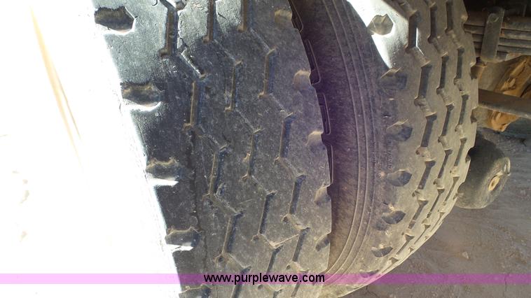 image for item J1335 1998 International 4700 flatbed truck