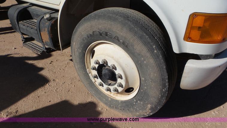 image for item J1335 1998 International 4700 flatbed truck