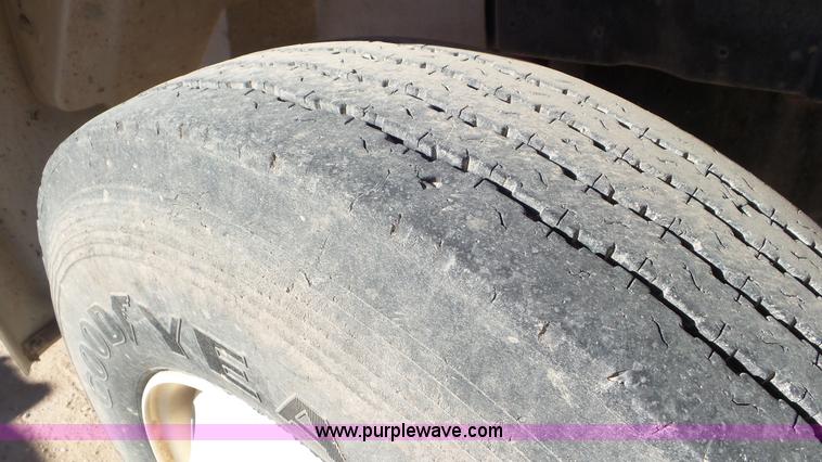 image for item J1335 1998 International 4700 flatbed truck