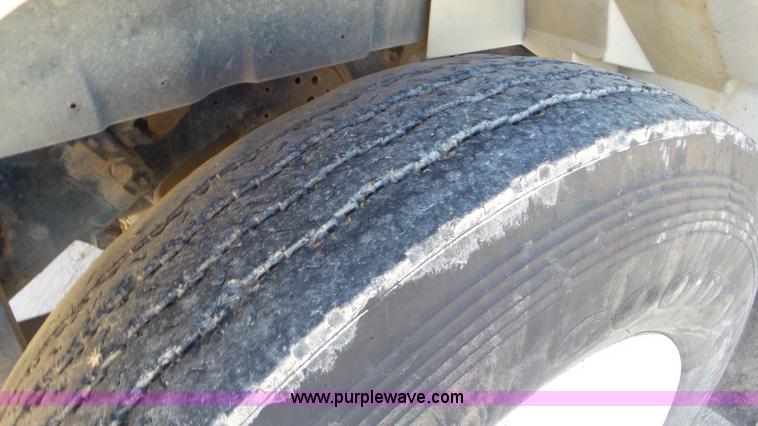 image for item J1335 1998 International 4700 flatbed truck