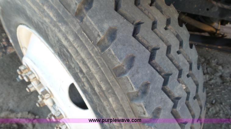 image for item L4491 2003 International DuraStar 4300 digger derrick truck