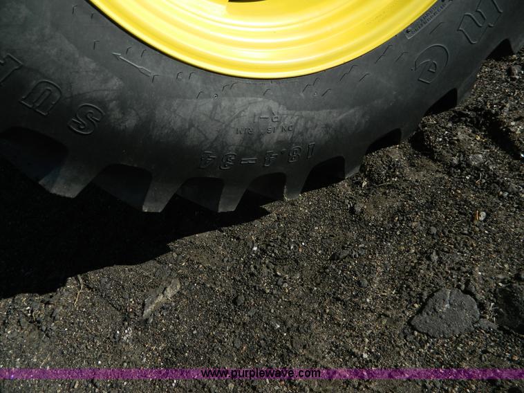 image for item BQ9995 2012 John Deere 6140D MFWD tractor