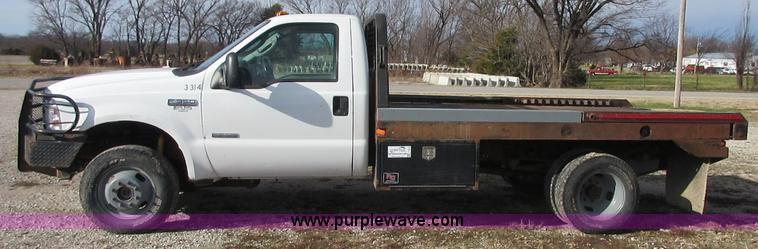 image for item I1818 2007 Ford F350 Super Duty XL flatbed pickup truck