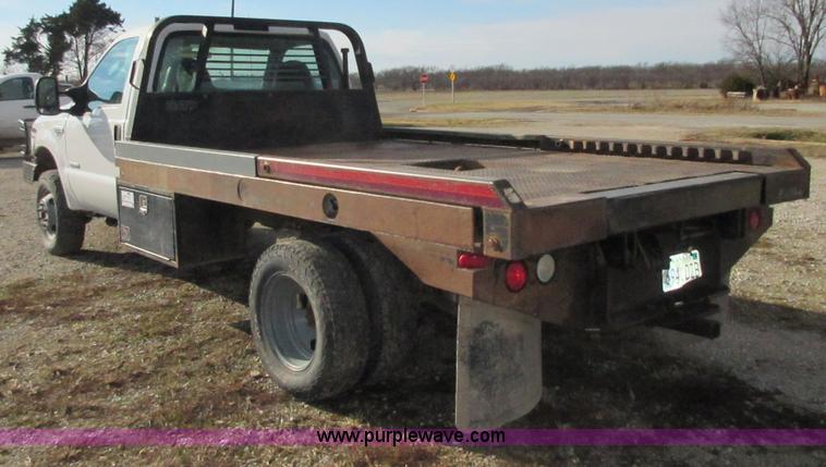 image for item I1818 2007 Ford F350 Super Duty XL flatbed pickup truck
