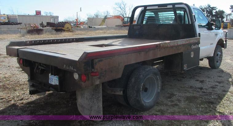 image for item I1818 2007 Ford F350 Super Duty XL flatbed pickup truck