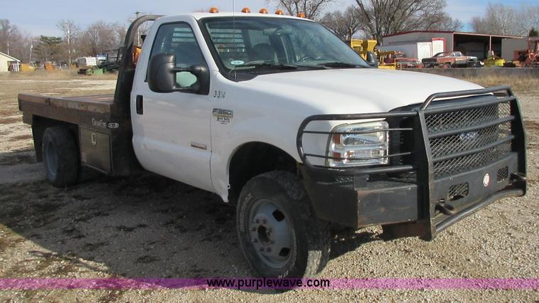 image for item I1818 2007 Ford F350 Super Duty XL flatbed pickup truck