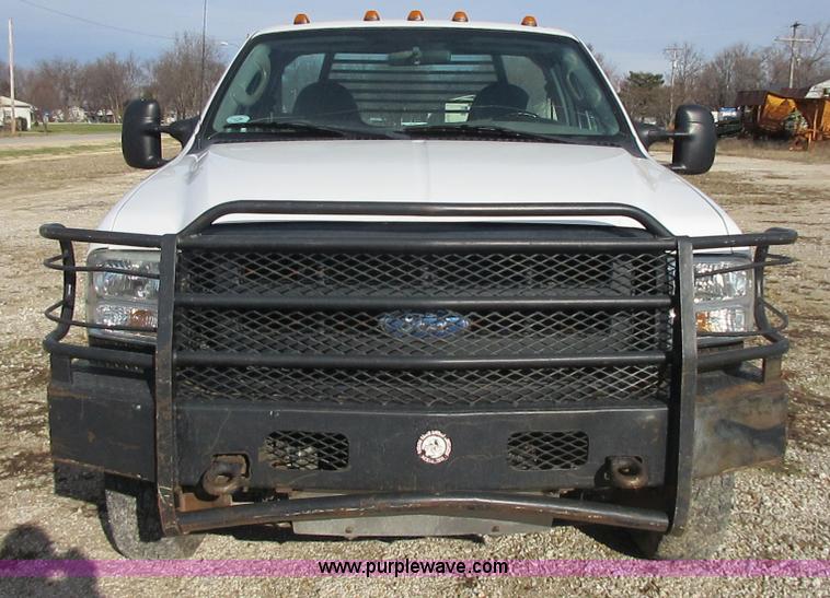 image for item I1818 2007 Ford F350 Super Duty XL flatbed pickup truck