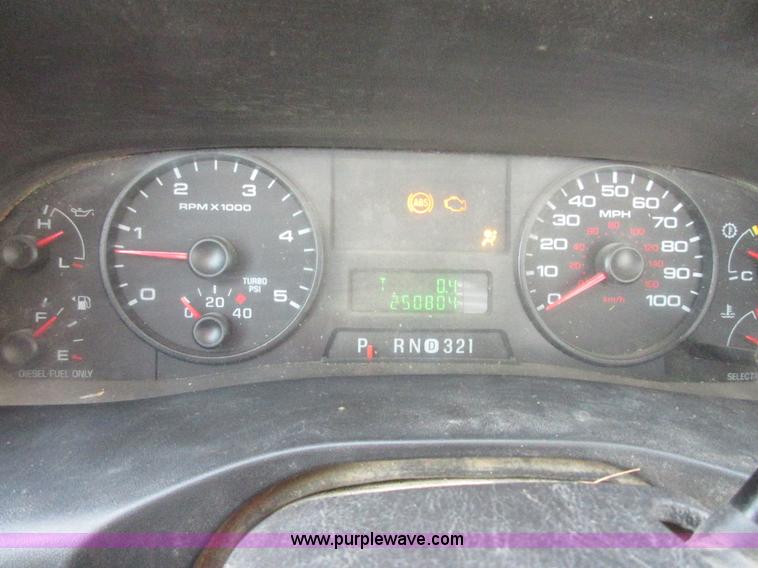 image for item I1818 2007 Ford F350 Super Duty XL flatbed pickup truck