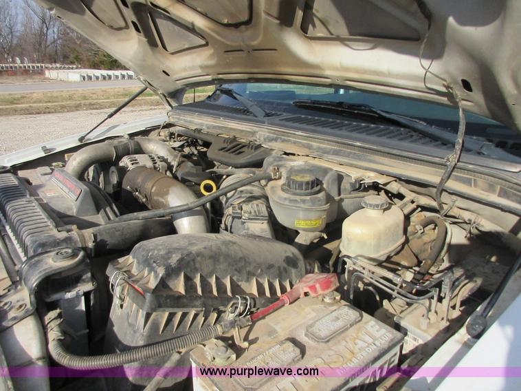 image for item I1818 2007 Ford F350 Super Duty XL flatbed pickup truck