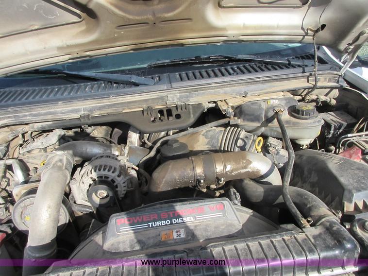 image for item I1818 2007 Ford F350 Super Duty XL flatbed pickup truck