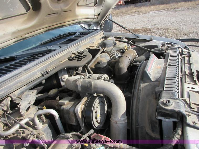 image for item I1818 2007 Ford F350 Super Duty XL flatbed pickup truck