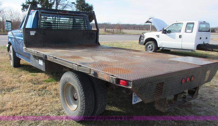 image for item I1819 1995 Ford F350 Super Duty XL flatbed pickup truck