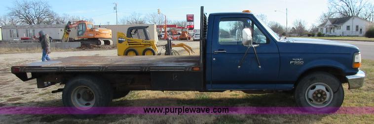image for item I1819 1995 Ford F350 Super Duty XL flatbed pickup truck