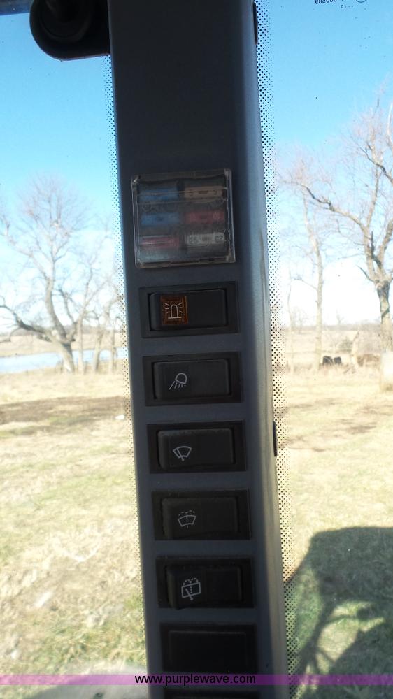 image for item J4610 2004 New Holland TN75DA tractor