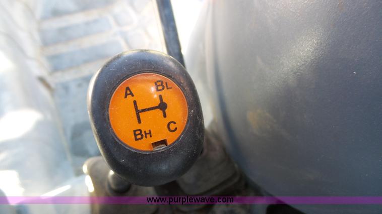 image for item J4610 2004 New Holland TN75DA tractor