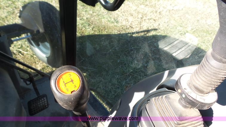 image for item J4610 2004 New Holland TN75DA tractor