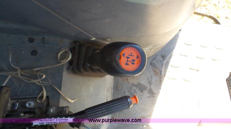 image for item J4610 2004 New Holland TN75DA tractor