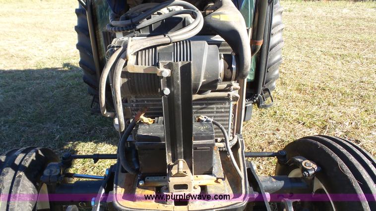 image for item J4610 2004 New Holland TN75DA tractor