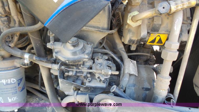 image for item J4610 2004 New Holland TN75DA tractor