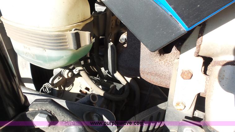 image for item J4610 2004 New Holland TN75DA tractor