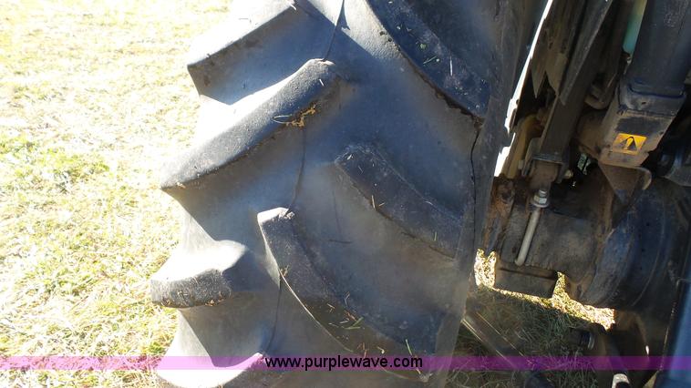 image for item J4610 2004 New Holland TN75DA tractor