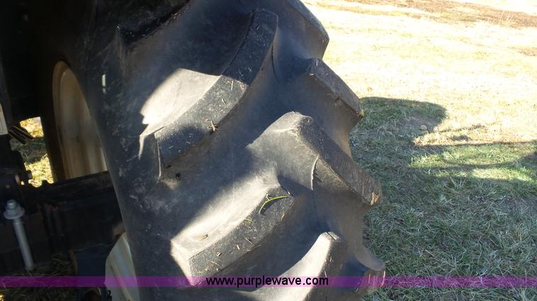 image for item J4610 2004 New Holland TN75DA tractor