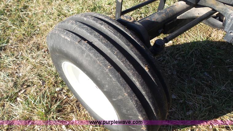 image for item J4610 2004 New Holland TN75DA tractor