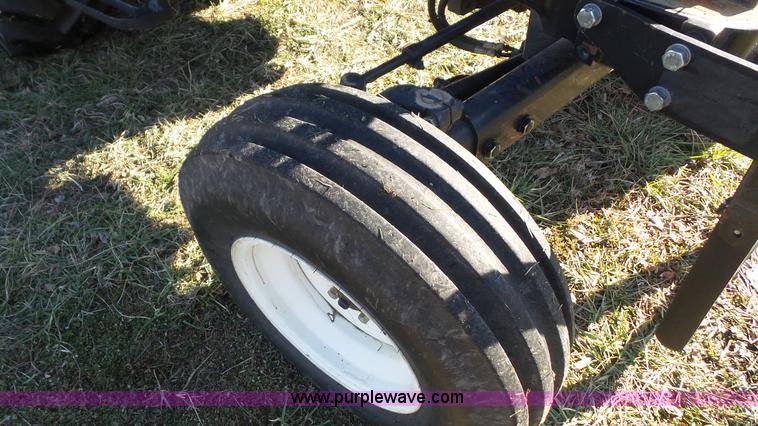 image for item J4610 2004 New Holland TN75DA tractor