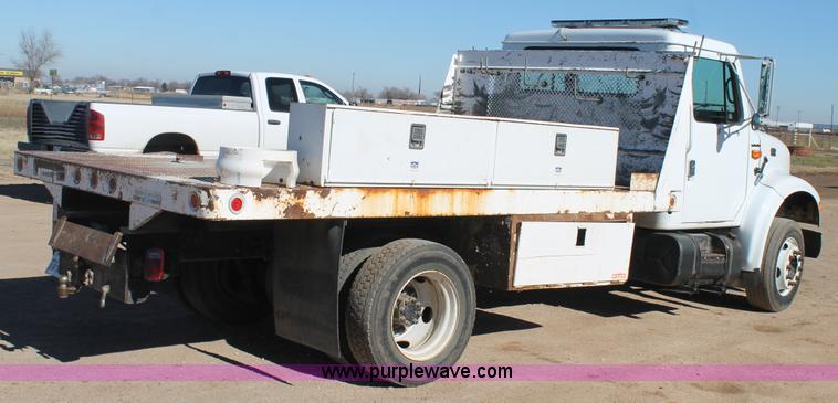 image for item J1313 2000 International 4700 flat bed truck
