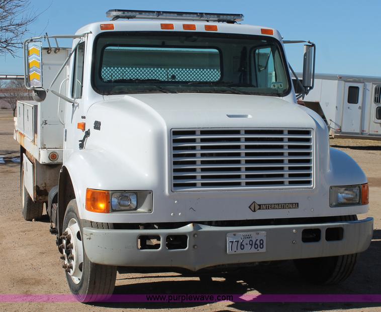 image for item J1313 2000 International 4700 flat bed truck