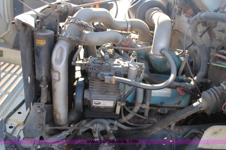 image for item J1313 2000 International 4700 flat bed truck