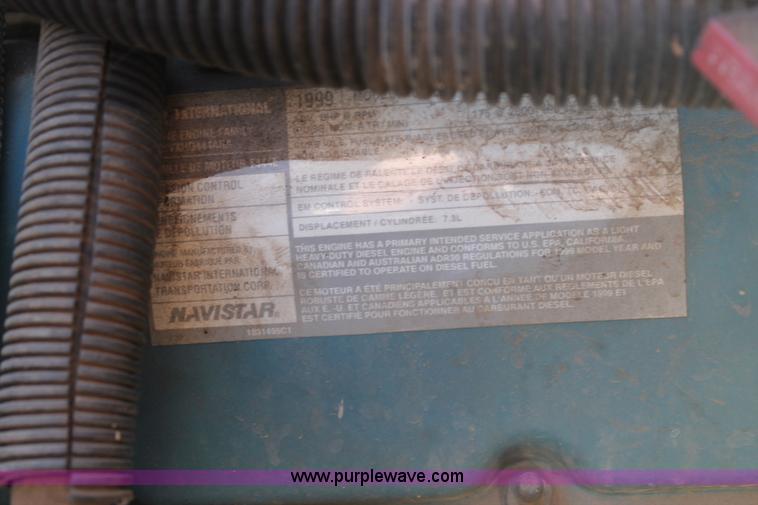 image for item J1313 2000 International 4700 flat bed truck