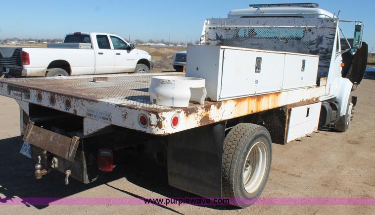 image for item J1313 2000 International 4700 flat bed truck