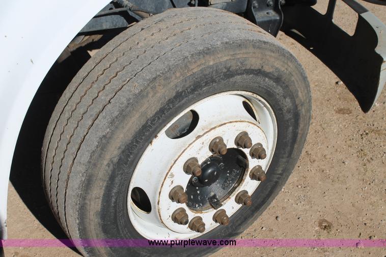 image for item J1313 2000 International 4700 flat bed truck