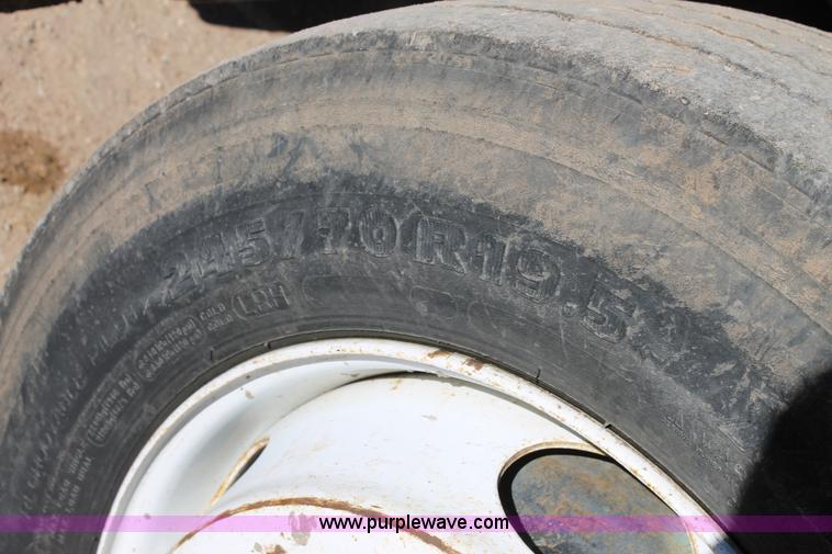 image for item J1313 2000 International 4700 flat bed truck