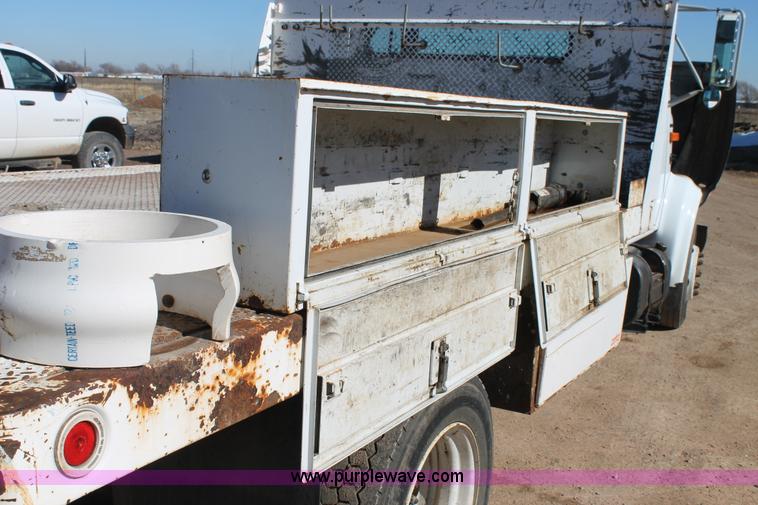 image for item J1313 2000 International 4700 flat bed truck