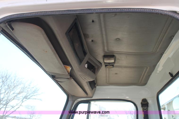 image for item J1313 2000 International 4700 flat bed truck