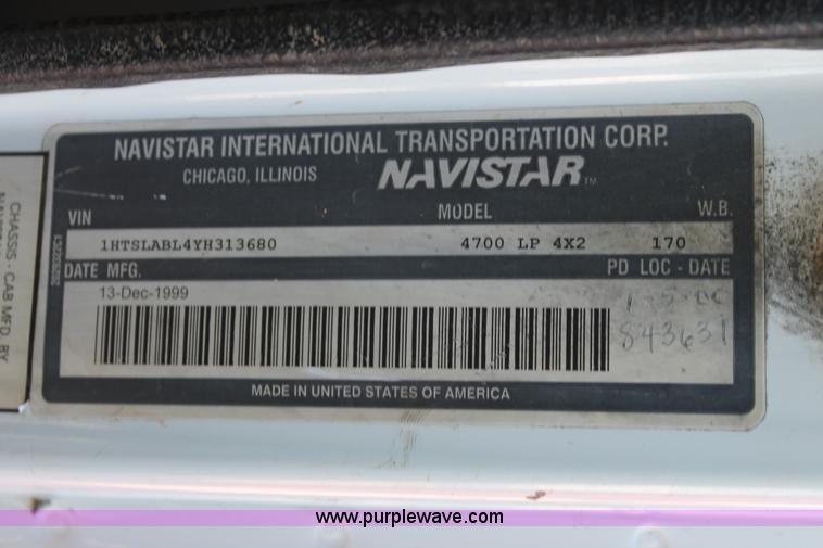 image for item J1313 2000 International 4700 flat bed truck